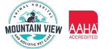Logo for Mountain View Animal Hospital and Holistic Pet Care alongside the AAHA Accreditation logo. The Mountain View Veterinarian logo features a dog silhouette over mountains and text, bordered with the hospital's name. The AAHA logo is a red square with "AAHA" in white.